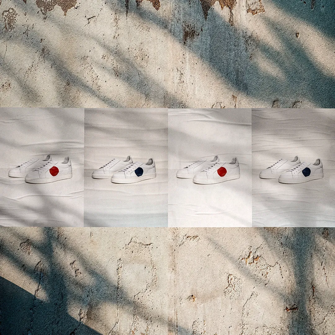 Four product photography posters of white Edertu sneakers with red and blue heels on light fabric and a shadow-streaked concrete wall