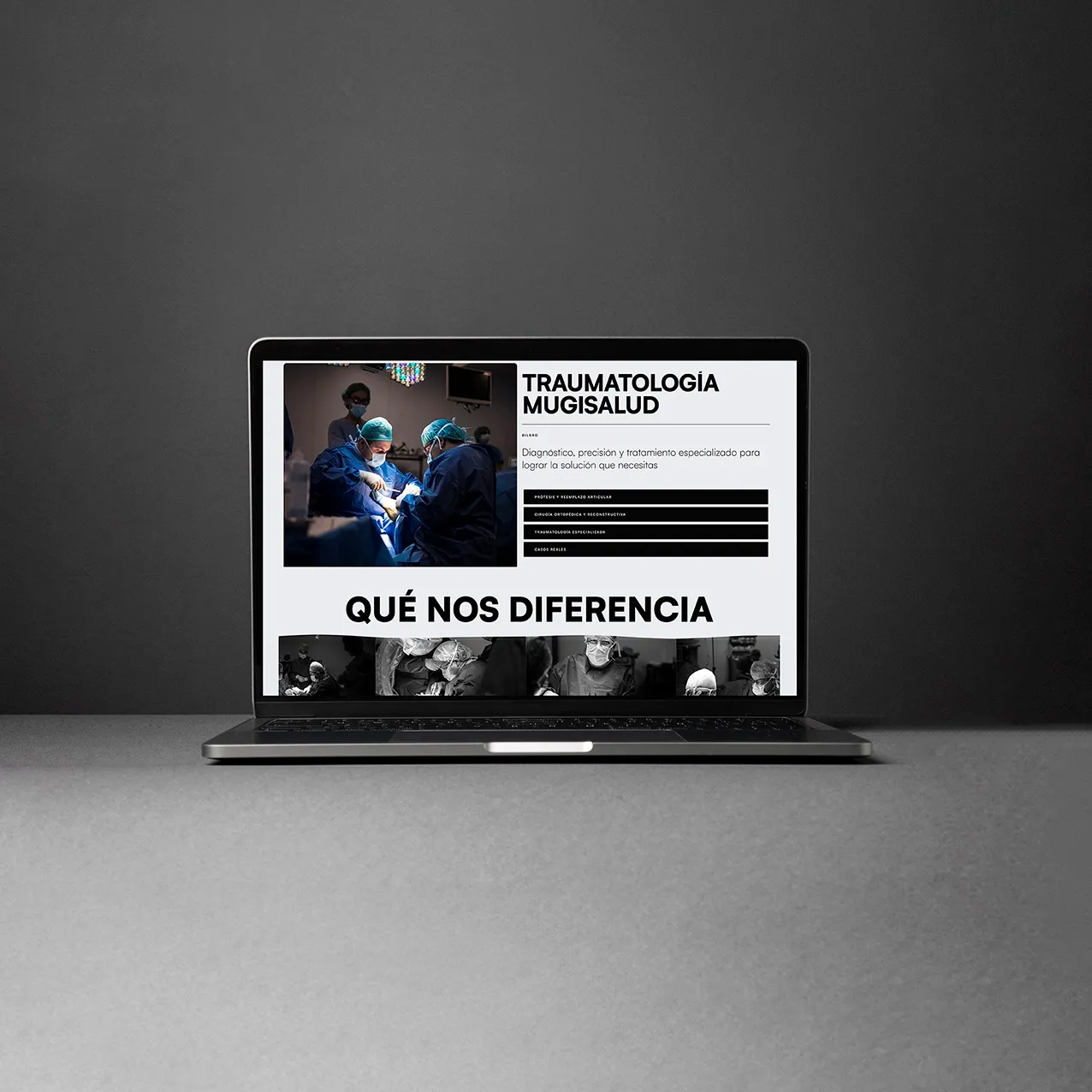 Mugisalud Traumatología website on a laptop, with operating-room photos and orthopedic surgery sections on a dark grey backdrop.