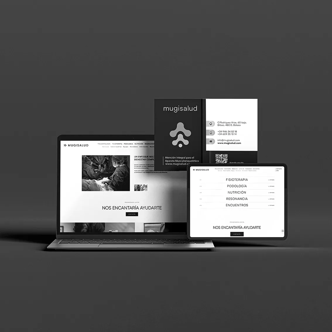 Mugisalud website on laptop, tablet and business card in black and white, with a services menu and the Bilbao clinic's contact details.